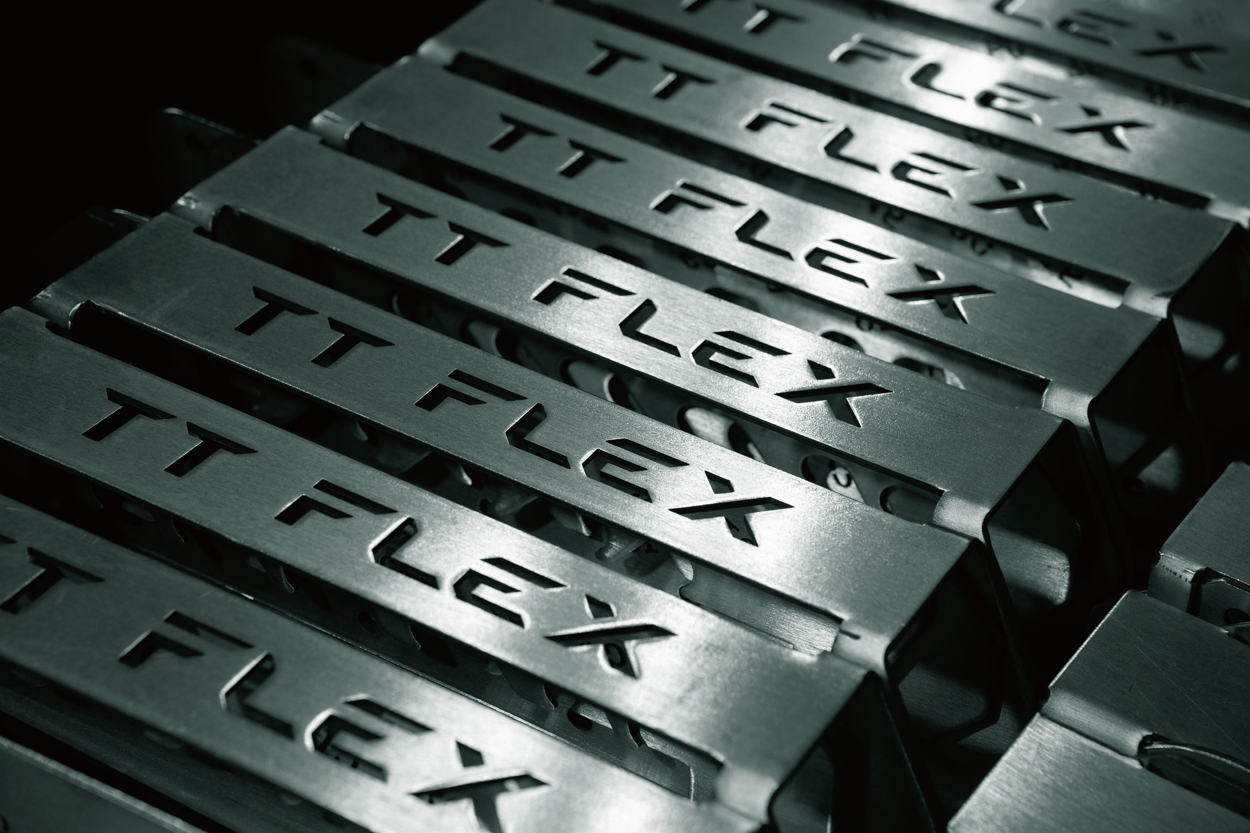 TT-FLEX branded metal components in production